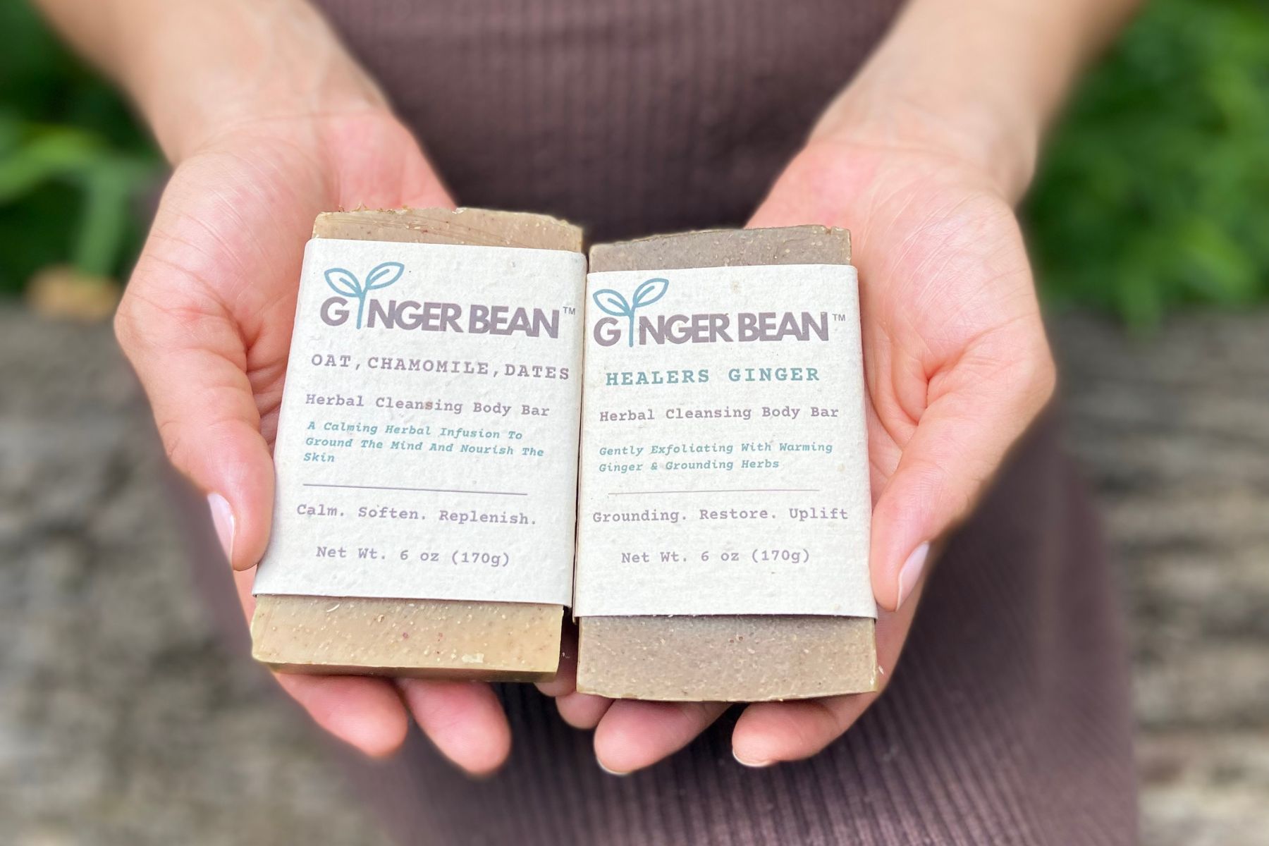 Kayla holding Ginger Bean™ bars outdoors